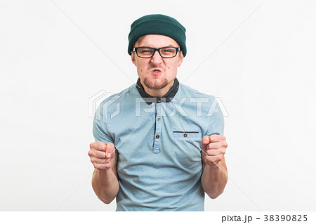portrait of young angry man on white background 38390825