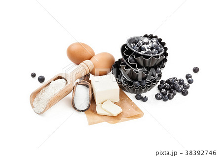 Baking ingredients on white. 38392746