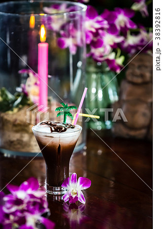 Still life Iced coffee with cream orchid flowers 38392816