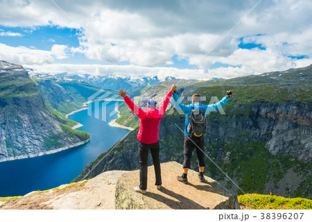 Couple posing on Trolltunga Norway 38396207