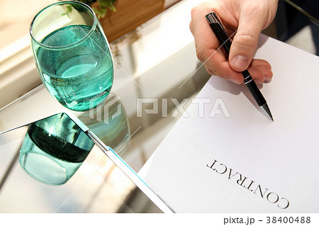 Businessman is signing a contract,contract details 38400488