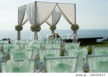 Beautiful wedding set up ceremony on green lawn 38400637