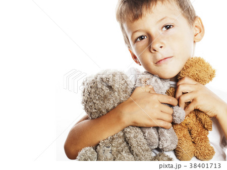 little cute boy with many teddy bears hugging 38401713