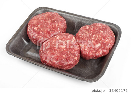 Tray with raw beef burgers or minced meat isolated 38403172