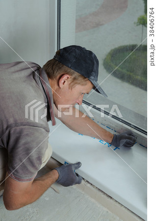 Installing window sill 38406764