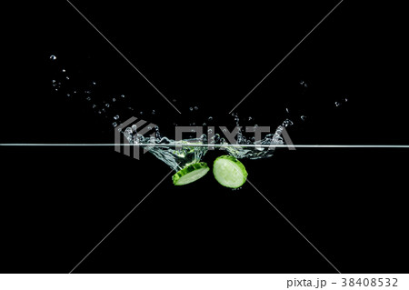 cucumber in water with splash cucumber in water with splash 38408532