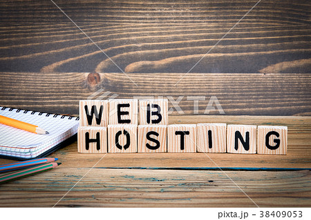 web hosting. Wooden letters on the office desk, informative and communication background 38409053