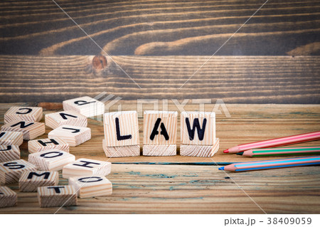 LAW. Wooden letters on the office desk, informative and communication background 38409059