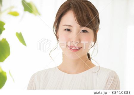 Smiling japanese girl Stock Photo by ©elwynn 4090243