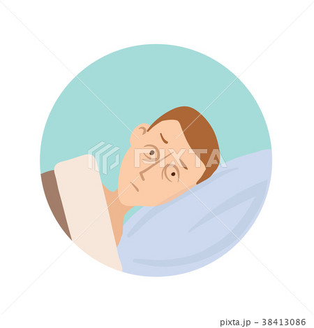 The young man lies in bed with his eyes open 38413086