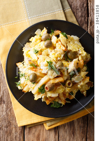 Bacalhau Bass - roasted cod, potatoes, onions 38413858