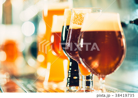 Beer taps in a pub Beer taps in a pub 38419735