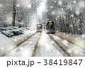 Two trams in a snowfall on a frosty day in winter 38419847