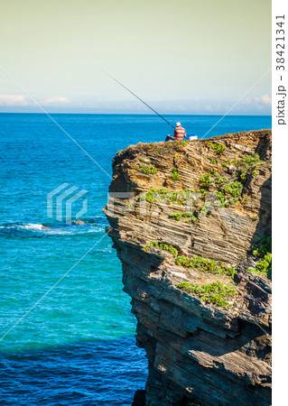 fisherman on the rocks,Ribadeo, Spain fisherman on the rocks,Ribadeo, Spain 38421341