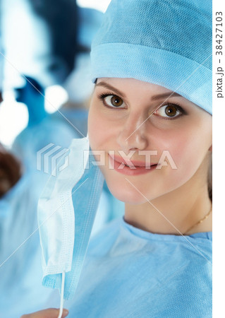 Close up portrait of young female surgeon doctor 38427103