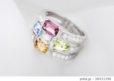 White gold ring with citrine peridot, blue topaz 38431596