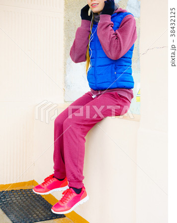 Woman wearing warm sportswear 38432125