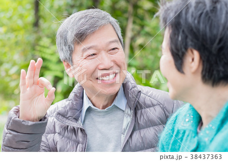 old couple chatting old couple chatting 38437363