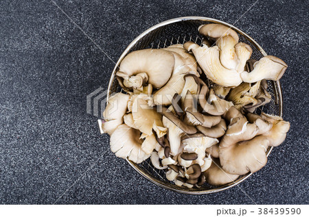 Oyster mushrooms for cooking on gray background 38439590