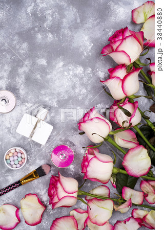 Bouquet of roses with cosmetics in perfume on a 38440880