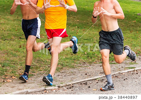 Three teenage boys train for cross country running 38440897
