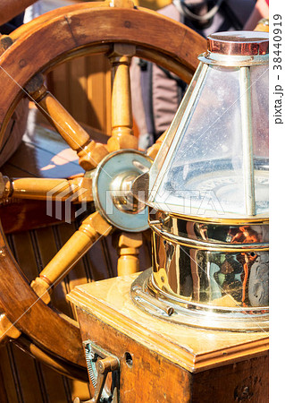 Sailboats steering wheel and compass Sailboats steering wheel and compass 38440919