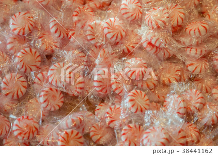 Lollipops striped background close up Lollipops striped background close up 38441162