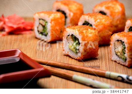 California roll sushi with shrimp and avocado. 38441747