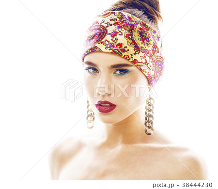 young pretty modern girl with bright shawl on head young pretty modern girl with bright shawl on head 38444230