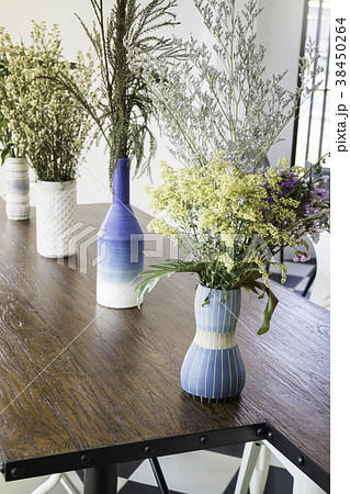 Beautiful flower vase decorated on wooden table Beautiful flower vase decorated on wooden table 38450264