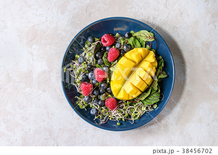 Green salad with berries Green salad with berries 38456702