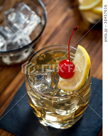 Glass of whiskey sour cocktail Glass of whiskey sour cocktail 38457616