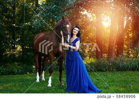 beautiful girl in dress with horse 38459906