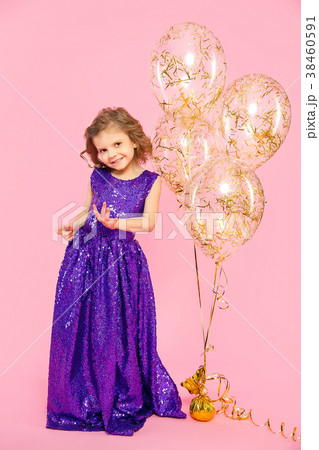 Festive little girl with balloons 38460591