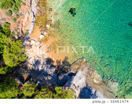 Aerial view of sandy beach with rocks and water Aerial view of sandy beach with rocks and water 38461474