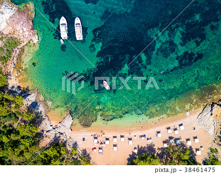 Aerial view of sandy beach with sunbathing tourist 38461475