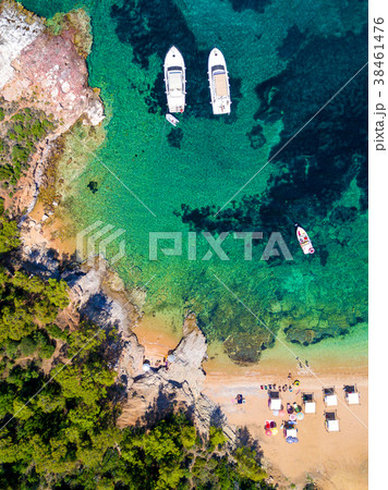 Aerial view of sandy beach with sunbathing tourist Aerial view of sandy beach with sunbathing tourist 38461476