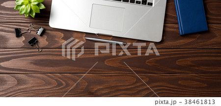 Overhead shot of wooden office desktop Overhead shot of wooden office desktop 38461813