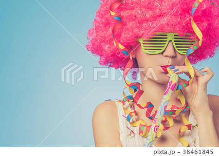 Portrait of beautiful party woman in pink wig Portrait of beautiful party woman in pink wig 38461845