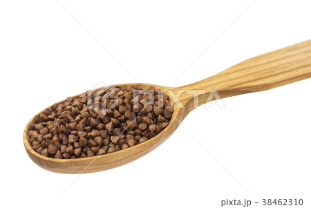 Buckwheat in wooden spoon isolated on white Buckwheat in wooden spoon isolated on white 38462310