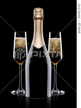 Elegant glasses and bottle of yellow champagne Elegant glasses and bottle of yellow champagne 38462542