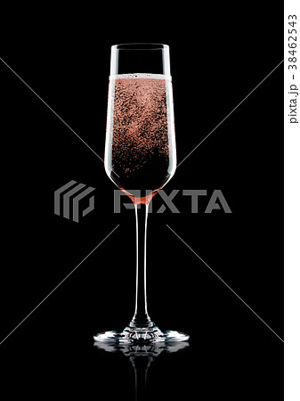 Rose pink champagne glass with bubbles on black Rose pink champagne glass with bubbles on black 38462543