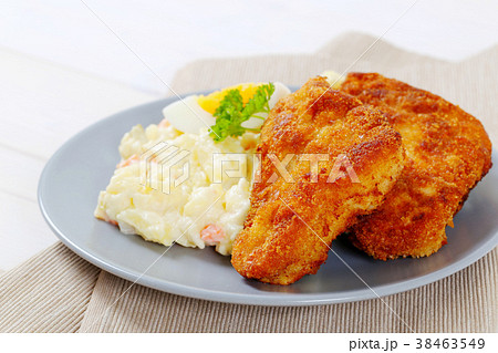 schnitzels with potato salad 38463549