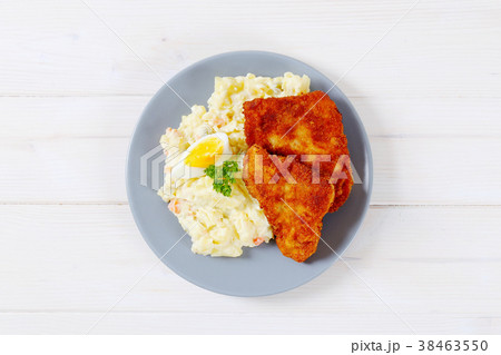 schnitzels with potato salad 38463550