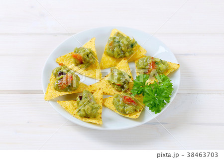 tortilla chips with guacamole tortilla chips with guacamole 38463703