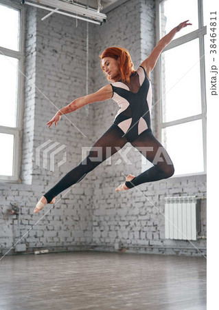 Beautiful ballet dancer posing in dance studio 38464811