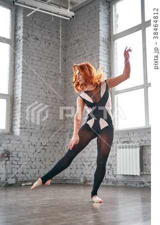 Woman dancer, in beautiful dynamic jump action 38464812
