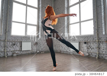 Woman dancer, in beautiful dynamic jump action Woman dancer, in beautiful dynamic jump action 38464817