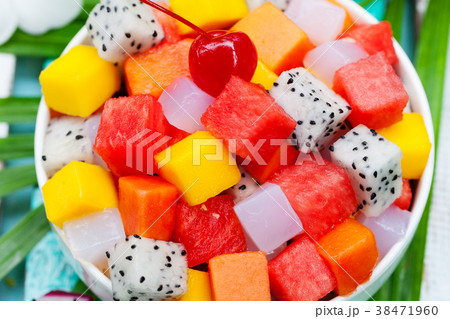 Bowl of fresh exotic fruit salad Top view Close up Bowl of fresh exotic fruit salad Top view Close up 38471960