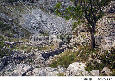 old stone ruins in the mountains in the town of 38475337